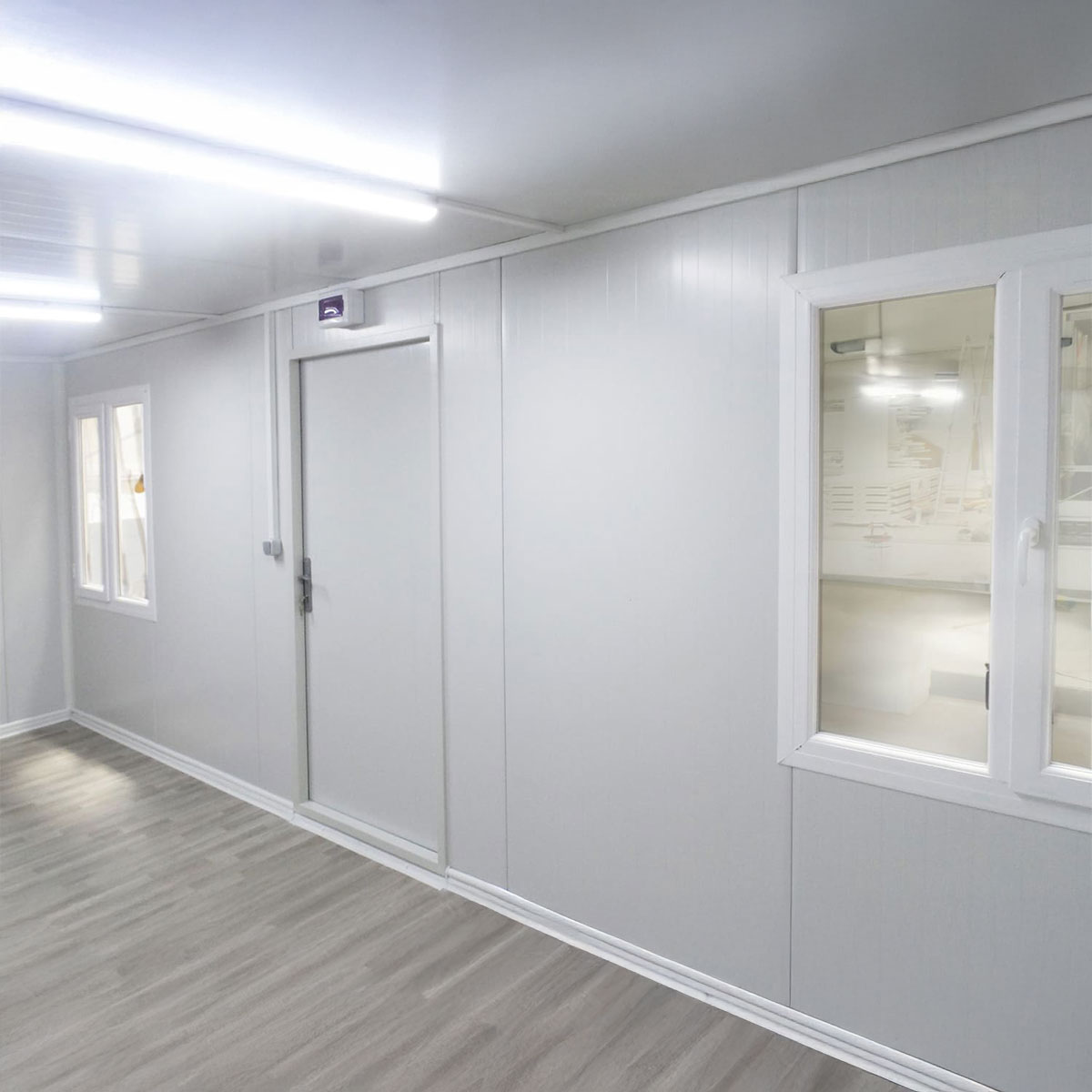 Module T UK | OC-A3000.1 – Site Office Container with U-Shaped Workstation (7.2 m²)