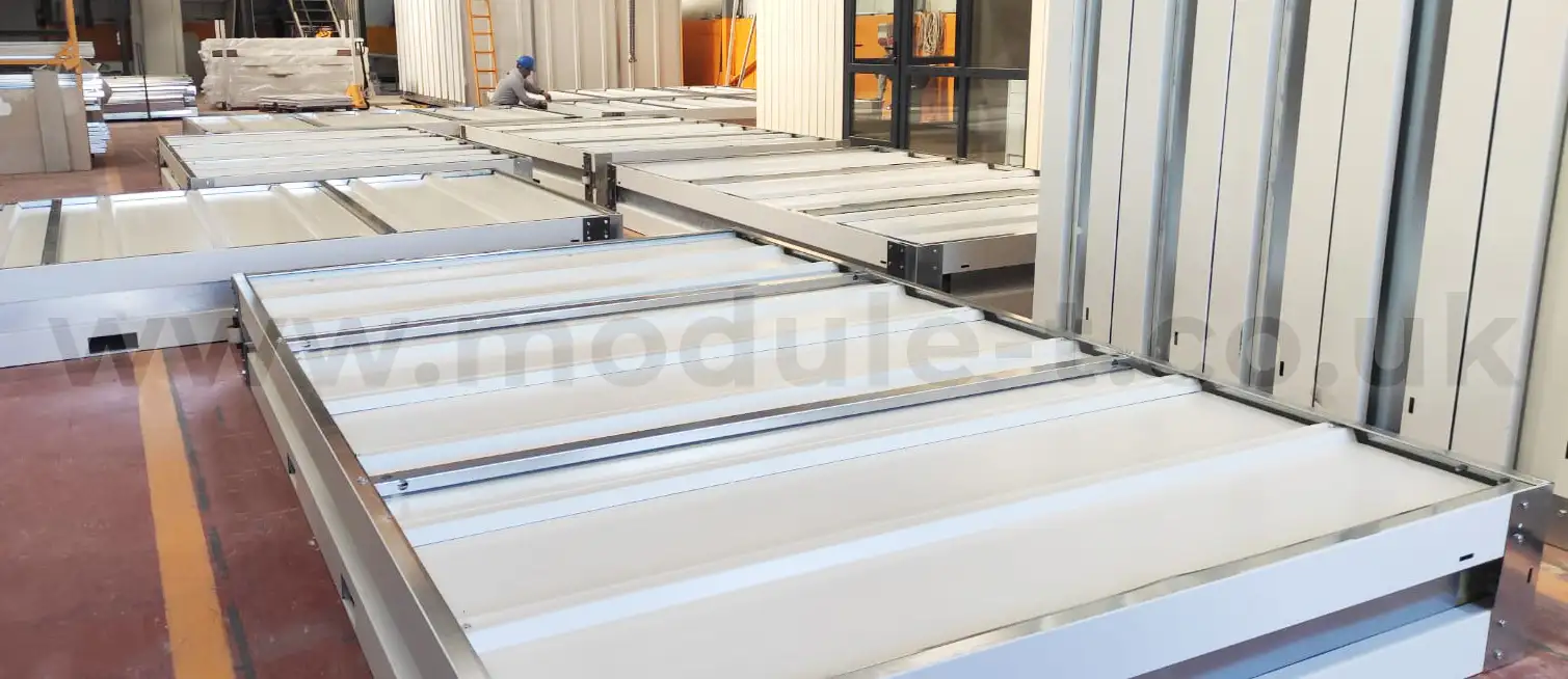 Flat-pack cabin components packed for transport