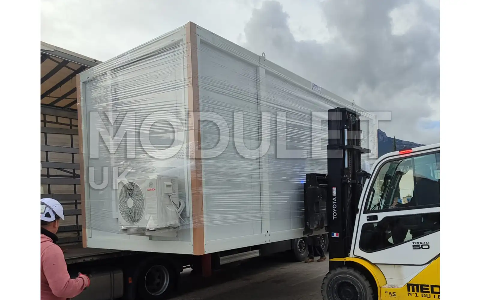 Office container handled by forklift — Module-T UK