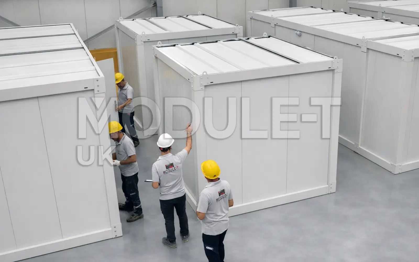 Office containers during factory assembly — Module-T UK